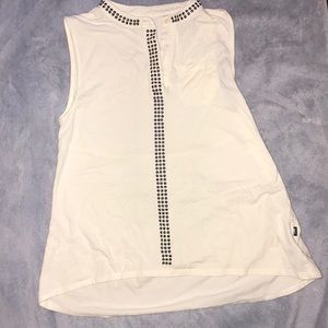 A blouse for kids. White with black rhinestones